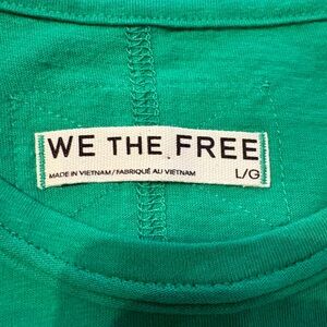 Free people:”We The Free People T”. Brand new Green Crewneck Tee